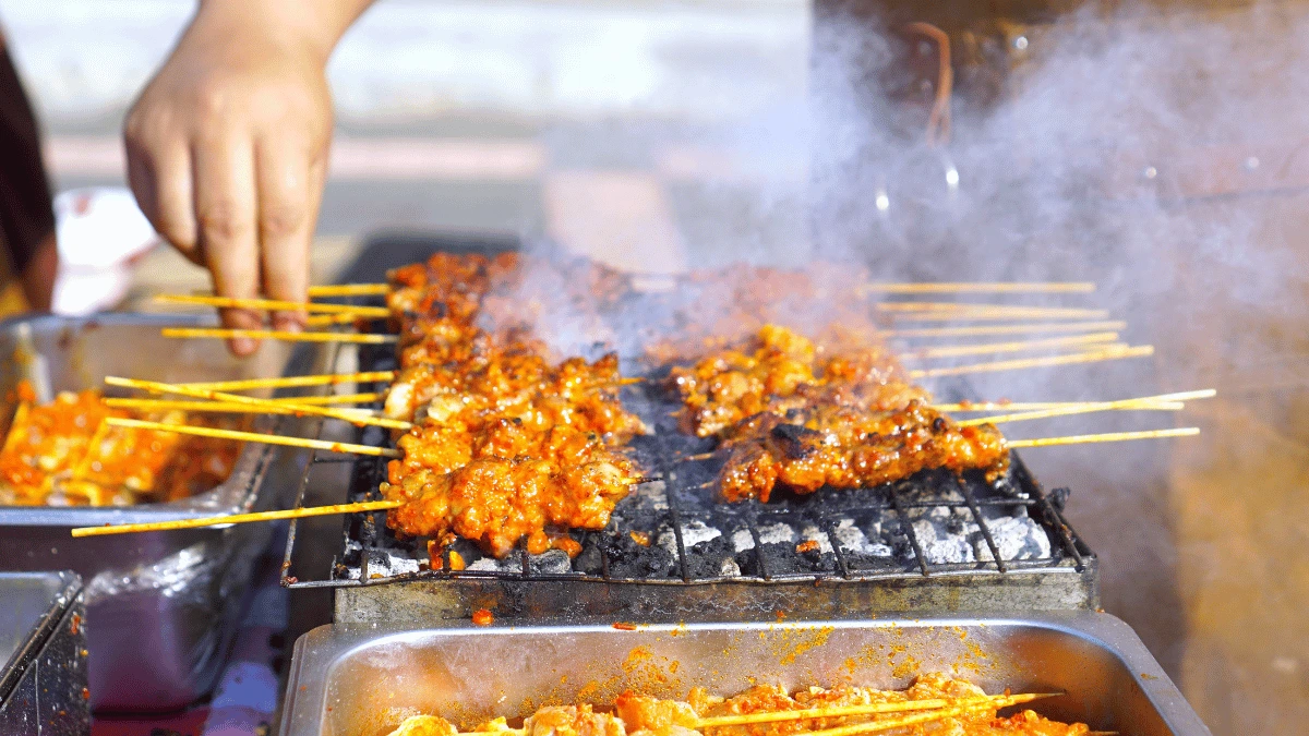 An image of a food stall, cooking hot food